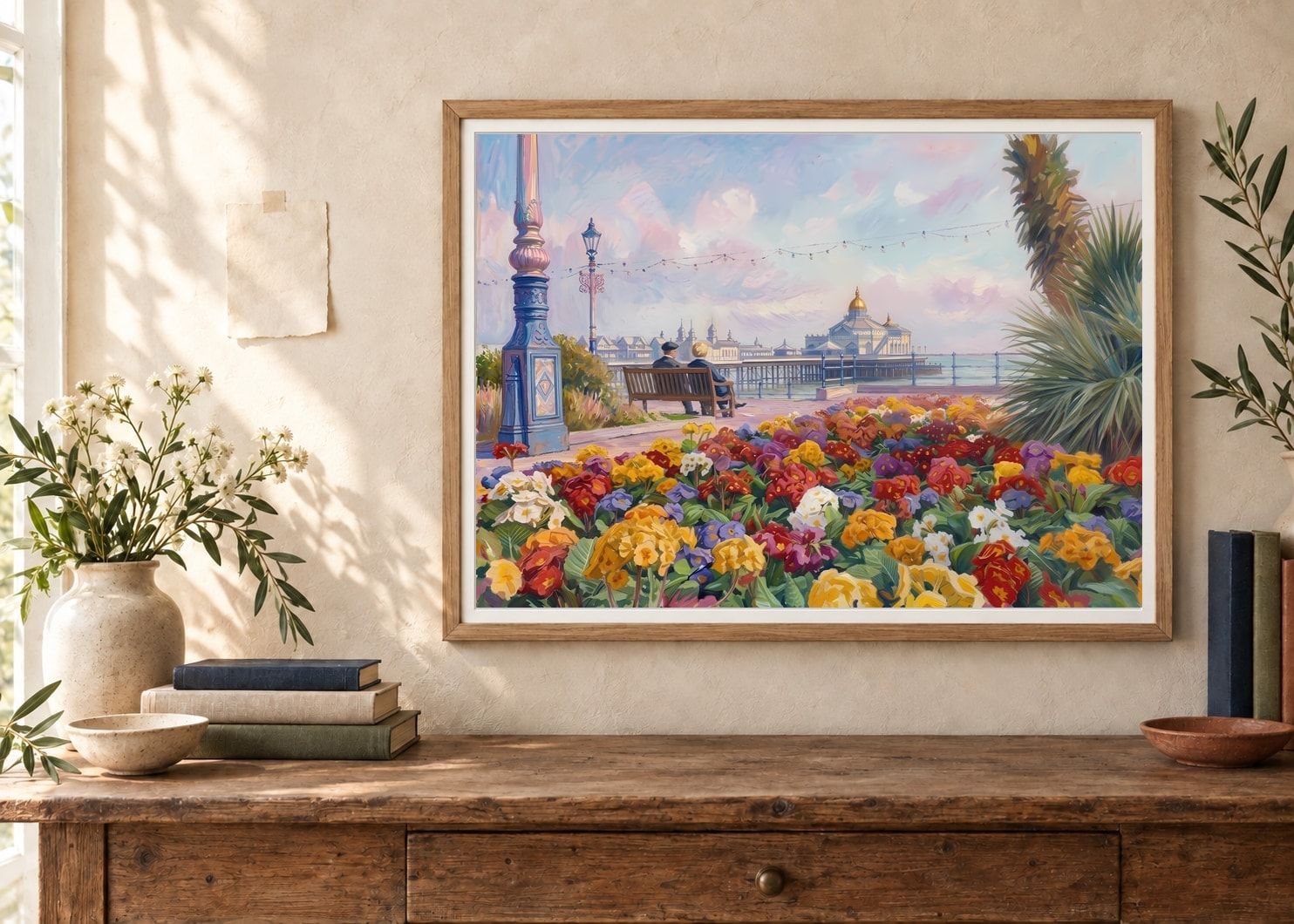 Eastbourne's pier and flower beds presented as a framed Paper Seal Studio print in a warm home interior